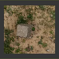 Rough Natural Stone Block on Square Dirt Ground Surrounded by Small Stones and Green Plants