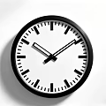 Round Wall Mounted Clock With White Dial Black Hands And Minimalist Design