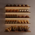 Assorted Fresh Bread Loaves Rolls And Baguettes On Wooden Wall Shelves