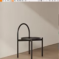 Black Console Table With Arched Metal Frame And Round Top In Minimalist Design