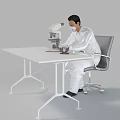 Man In White Lab Coat Using Microscope With Laboratory Equipment On Table
