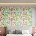 Vibrant Bedroom Featuring Colorful Cartoon Patterned Wall With Pink Accents And Bedside Decor