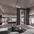 Modern Clothing Store Interior With Apparel On Display Racks And Seating Area