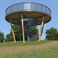 Circular Road Observation Decks With Spiral Stairs Wooden Structures And Metal Railings On Grassland