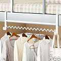 School Dormitory Organized Wardrobe Space With Wooden Hangers And Hanging Clothes