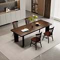 Dark Wooden Dining Table Set With Four Chairs Open Book Green Plant And Fruit Bowl