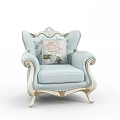 Light Blue Single Sofa with Ornate Carvings Curved Armrests Golden Legs and Decorative Floral Pillow