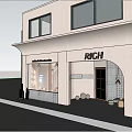 Modern Storefront with RICH Sign Coffee Tea Fashion Cake Arched Glass Door Green Plants Bench