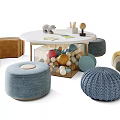 Children's Round Table with Soft Cushioned Stools and Playful Toys in Kids Room