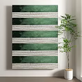 Green Striped Wall Art With White Lines Beside Potted Green Plant