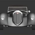 Elegant Vintage Convertible Car With Streamlined Dark Body And Chrome Accents