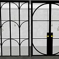 Modern Black Framed Sliding Doors Featuring Arched Glass Vertical Stripes And Indoor Plants