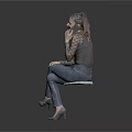 Woman With Pink Hair Wearing Lace Top And Jeans Sitting On Chair Talking On Phone