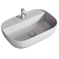 Modern White Ceramic Oval Bathroom Washbasin With Sleek Faucet And Smooth Surface Design
