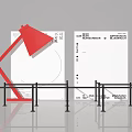 Modern Interactive Area Featuring Red Desk Lamp Display Boards And Black Barriers