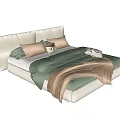 Cozy Double Bed With Cream Colored Headboard Green Quilt Brown Blanket And Pillows