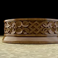 Round Wooden Pillar With Intricate Carved Patterns On Patterned Floor 3d model