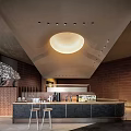 Modern Pantry Interior With Round Ceiling Light Bar Counter Brown Wall Tiles And Storage Shelves