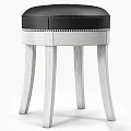 Round Black Leather Ottoman with Silver Rivet Trim and Light Wood Legs