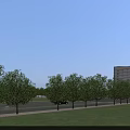 Two Modern Multi Story Office Buildings With Large Windows Road And Green Landscaping