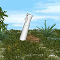 White Cosmetic Perfume Spray Bottle On Green Grass With Yellow Flowers And Blue Sky