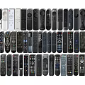 Collection Of Various Electronic Remote Controls With Different Designs And Models
