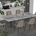 Modern Dining Space With Marble Table Clear Acrylic Legs And Gray Upholstered Chairs