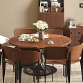 Round Dining Table Set With Four Chairs Fresh Flowers And Black White Rug