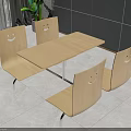 Wooden Dining Table With Four Smiley Face Pattern Chairs And Gray Wall Tile Floor Setting 3d model