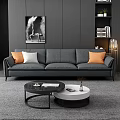 Gray Three Seater Sofa With Orange White Cushions In Modern Living Room With Wall Art