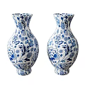 Pair of Blue and White Ceramic Vessels with Floral Patterns for Home Decor