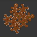 Freshly Baked Gingerbread Men Cookies Orange with White Icing Edges and Green Decorations