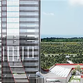 Modern Office Building Exterior With Greenery Covered Facade Red Structural Elements And Glass Walls