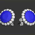 Elegant Round Blue Gemstone Earrings Surrounded by Small White Gemstones in Silver Setting