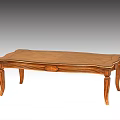 Elegant Classic Wooden Coffee Table with Intricate Carved Surface and Curved Legs