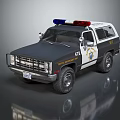 Black And White Police SUV With Emergency Lights And Badges