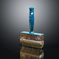 Vintage Paintbrush With Blue Handle And Brown Bristles On Reflective Surface