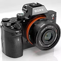 Sony Alpha 7S III Digital Camera with Black Body and Orange Lens Ring Design