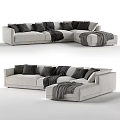 Modern Light Gray Sectional Sofa With Black Pillows And Cozy Throw Blankets