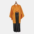 Traditional Japanese Orange Kimono With Black Obi And Patterned Skirt
