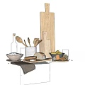 Wooden Cutting Boards Spoons Brushes And Bread On Kitchen Counter With Olive Oil Bottle