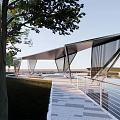 Modern Geometric Pergola with Sloped Roof Along Waterfront Pathway and Trees
