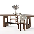Modern Wooden Dining Table With Chairs Featuring Circular Leg Cutouts Upholstered Seats And Vase Decor