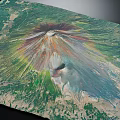 Volcanic Terrain Aerial View With Central Crater Radiating Lava Flows And Colorful Geological Features