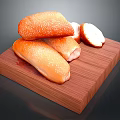 Fresh Sesame Seed Bread Rolls on Wooden Cutting Board with Sliced Pieces