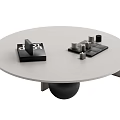 Round White Coffee Table With Black Spherical Base And Decorative Blocks 3d model