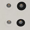 Ceiling Mounted Recessed Spotlights with White and Black Frames Illuminated in Modern Room
