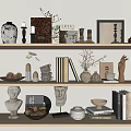 Stylish Decorative Ornament Set On Wooden Shelves With Busts Vases Candles Books And Dried Flowers