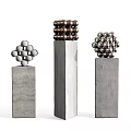 Three Abstract Sculptures With Metal Balls On Concrete Pedestals Geometric Stacked Designs