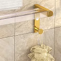 Wall Mounted Bathroom Rack With Transparent Design Golden Fixtures And Hanging Towels On Tile Wall